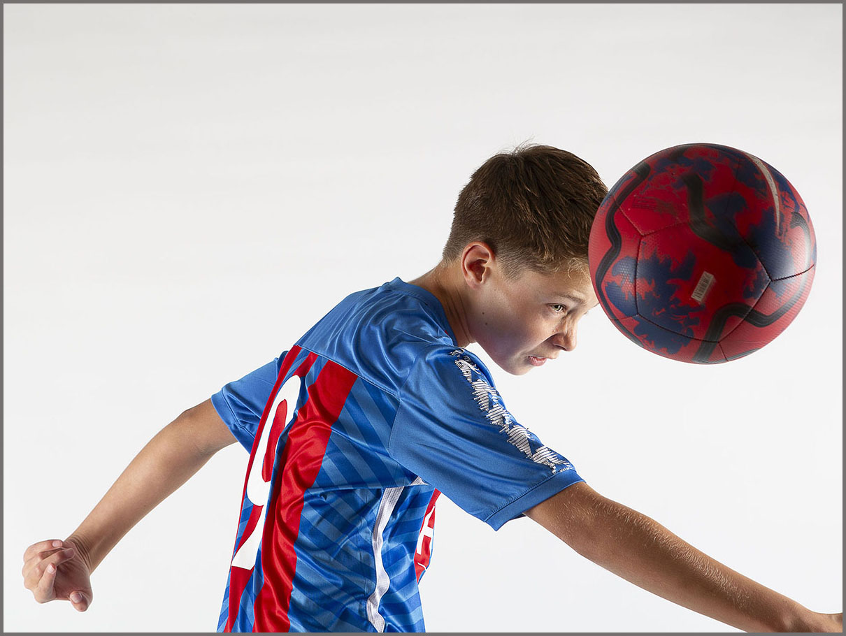 Dynamic football portrait captured at The North East Hobbies Portrait Competition by Village Photography Hebburn in Newcastle, Tyne & Wear